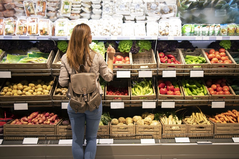 Woman at grocery store.