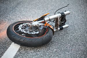 motorcycle wheel broken off from rest of bike