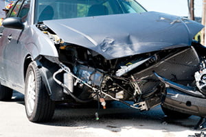 gray sedan smashed front end