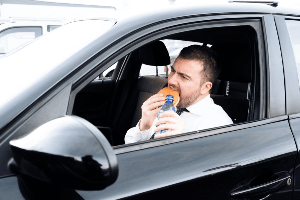 motorist eating while driving