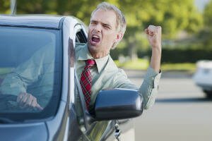 driver holding up a fist