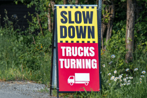 trucks turning warning sign